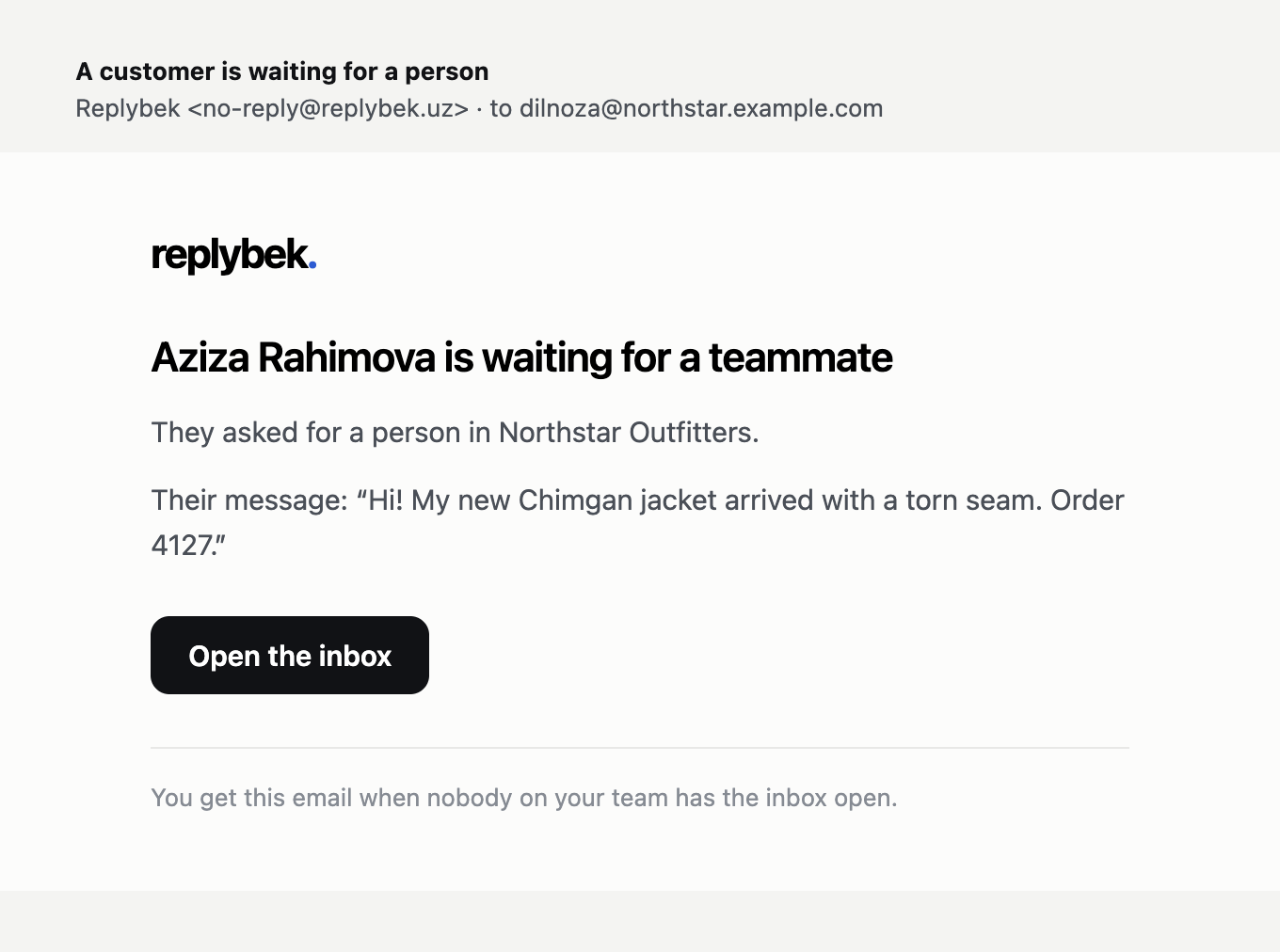 The email a teammate gets. "Open the inbox" goes straight to the conversation.